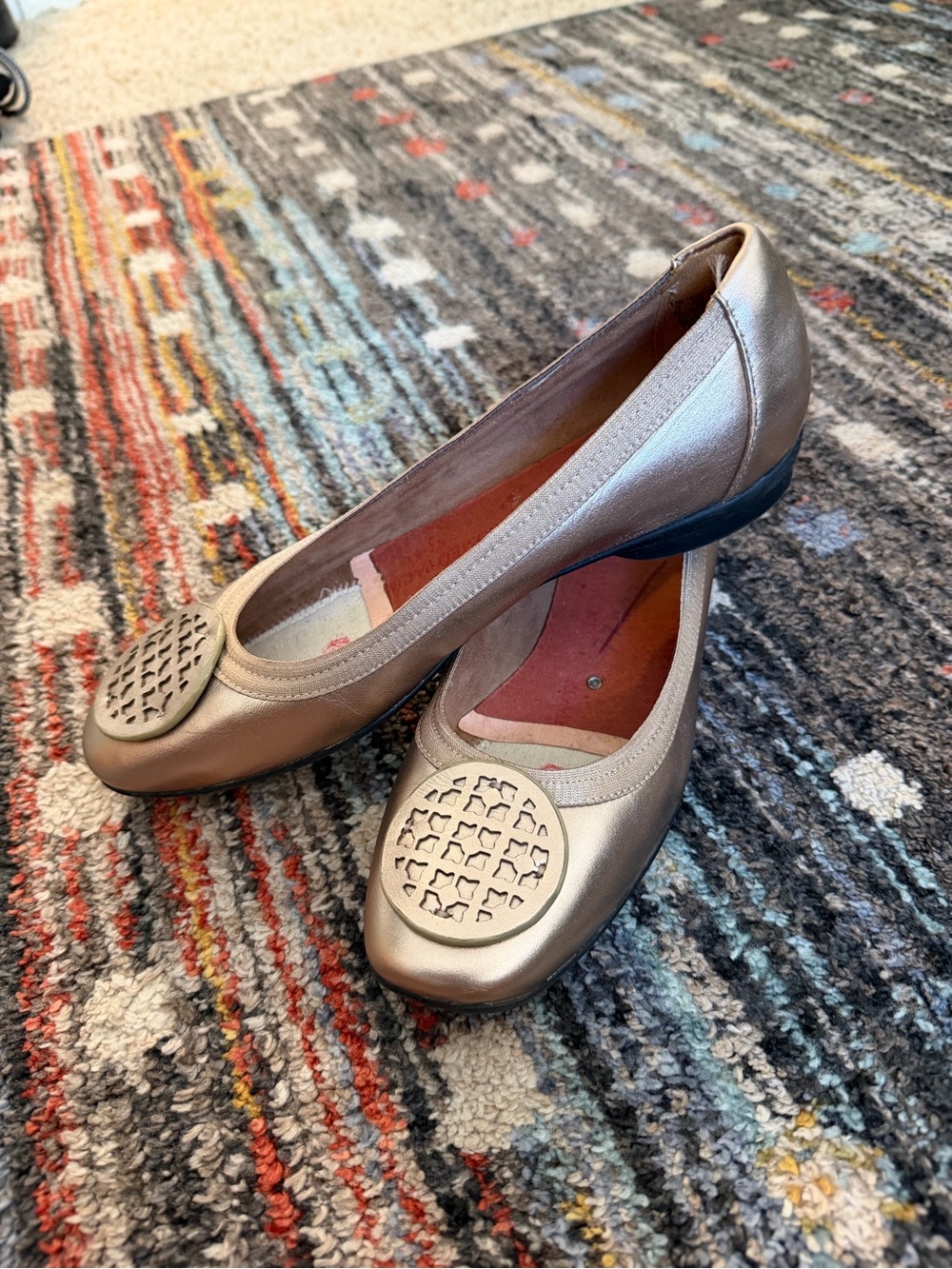 Clarks Metallic Gold Ballet Flats with Cutout Medallion